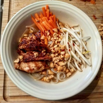 Mama's noodle bowl: rice vermicelli, marinated/grilled pastured chicken, bean sprouts, carrots, trotter stock, chili flakes, fish sauce, & peanuts